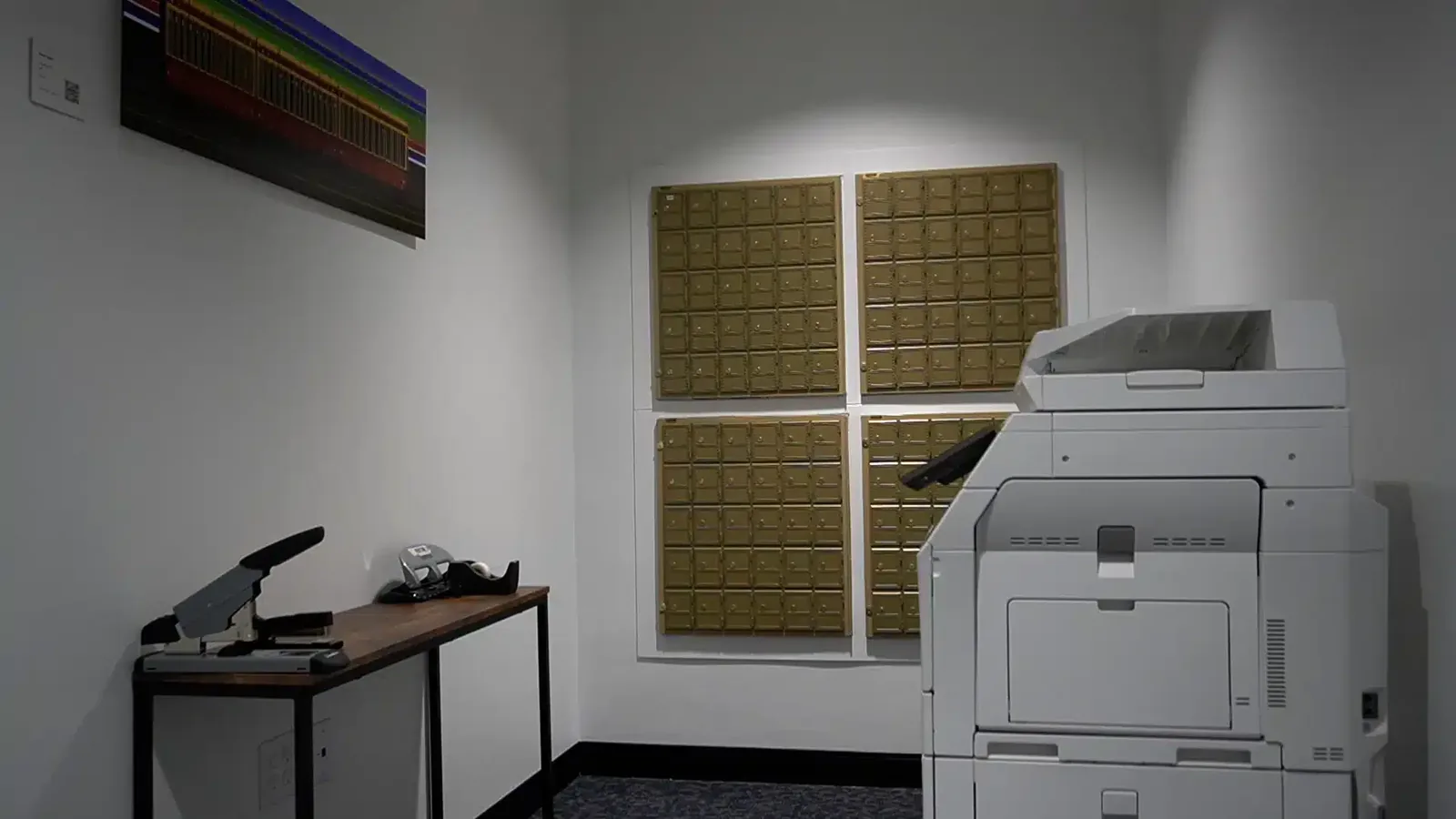 The member mailbox wall and business centre at SA Cowork, where virtual office mail is handled in San Antonio